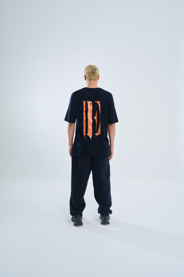 Melted logo | Classic Tee | Black Orange - Image 2